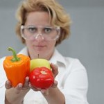 Female Scientist Offering Natural Food