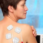 woman receiving electric stimulation