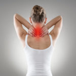 young woman suffering from spine neck pain