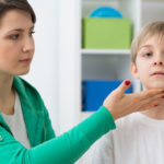 physiotherapist with a little boy