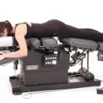a woman on the spinal decompression table