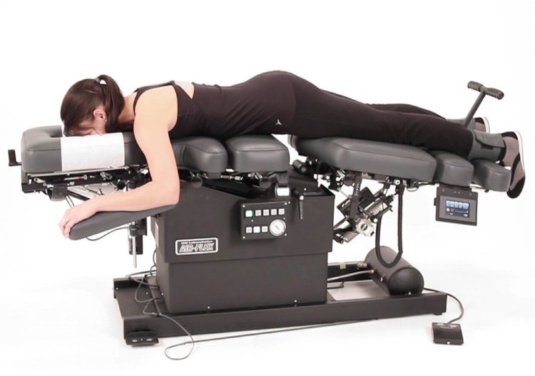 a woman on the spinal decompression table