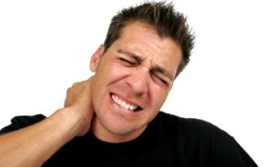 a man with neck pain hurting badly