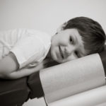 little girl on a chiropractic table