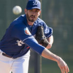 baseball player throwing a ball