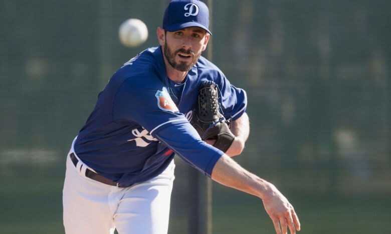 baseball player throwing a ball