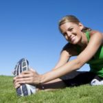 woman stretching before sport activity