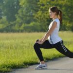 woman stretching outdoors