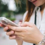 young woman texting