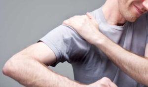 man with shoulder pain
