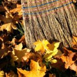 fall leaves and broom