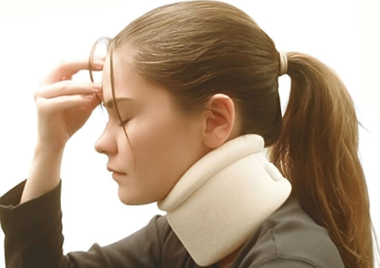 woman with neck brace due to whiplash