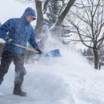 man shoveling snow