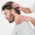 man receiving chiropractic treatment