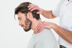 man receiving chiropractic treatment