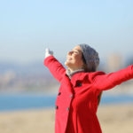 happy woman enjoying winter air