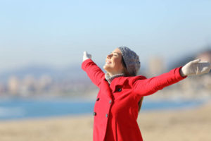 happy woman enjoying winter air