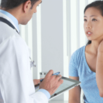 female patient talking to her doctor