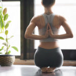 woman in yoga position for good posture