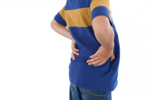 a boy with backache